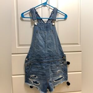 American Eagle blue short jean overalls. Women’s XS. Distressed. NWOT.
